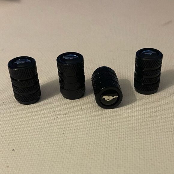 Mustang Logo valve Stem caps in Black set of 4 NWT - Picture 2 of 5